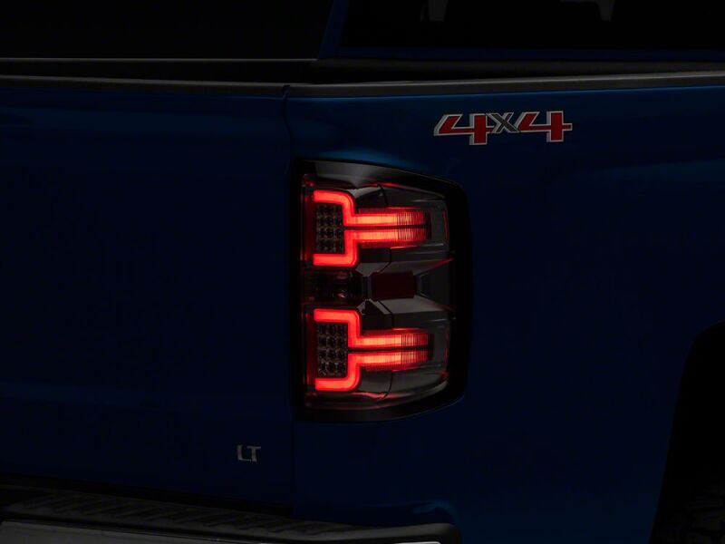 Raxiom 14-18 Chevrolet Silverado 1500 LED Tail Lights/SeqTurn Signals- Chrome- Smoked Lens thumbnail 3