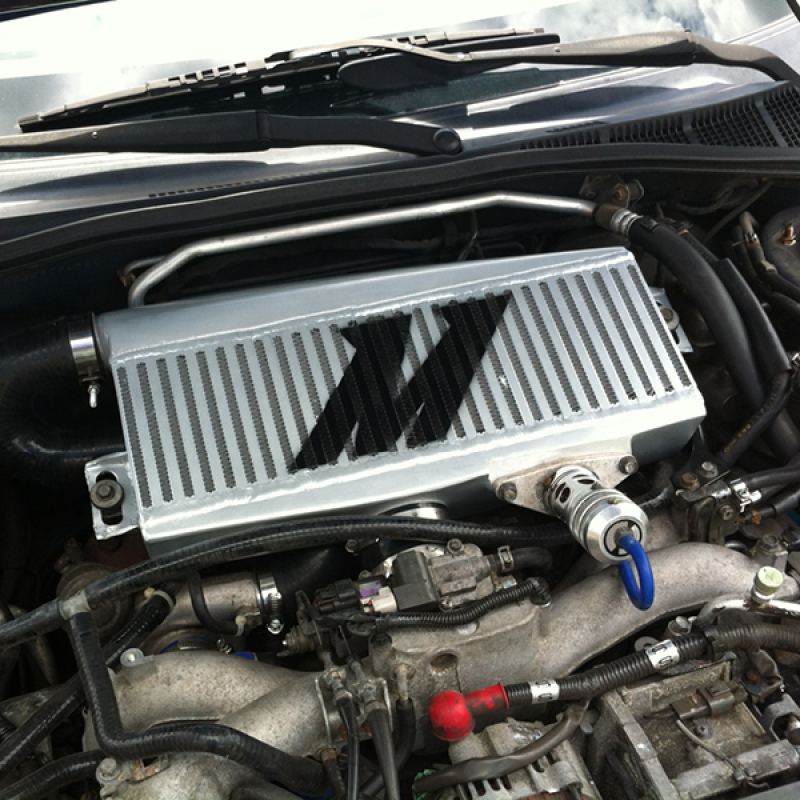 Mishimoto MMTMIC-WRX-01SLRD Top-Mount Intercooler Kit, Silver w/ Red Pipes, fits Subaru WRX/STI 2002-2007