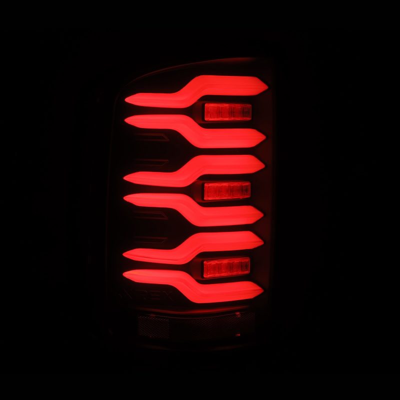 AlphaRex 14-18 GMC Sierra 1500/2500HD/3500HD LUXX-Series LED Tail Lights Blk w/Actv Light & Seq. Sig thumbnail 5
