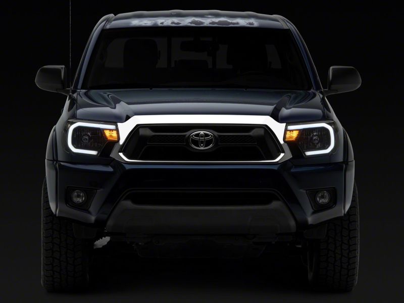 Raxiom 12-15 Toyota Tacoma Axial Series Headlights w/ LED Bar- Black Housing (Clear Lens) thumbnail 4