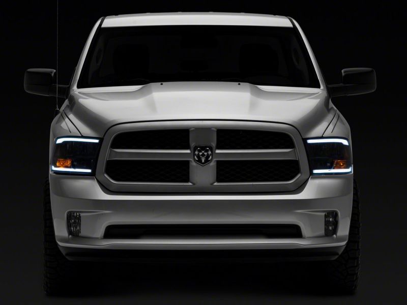 Raxiom 09-18 Dodge RAM 1500/2500/3500 Axial Series Headlights w/ LED Bar- Black Housing (Clear Lens) thumbnail 5