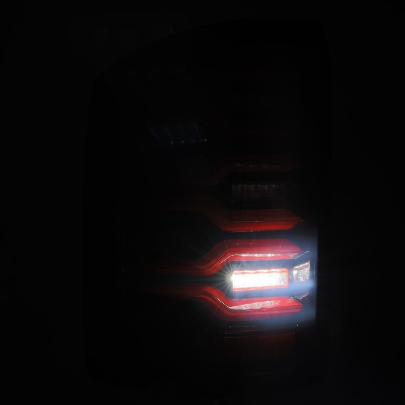 AlphaRex 14-18 GMC Sierra 1500/2500HD/3500HD LUXX-Series LED Tail Lights Blk/Red w/Actv Lgt Seq. Sig thumbnail 7