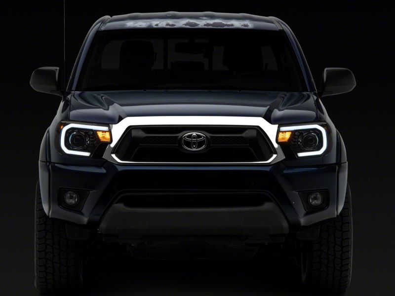 Raxiom 12-15 Toyota Tacoma Axial Series Projector Headlights w/ LED Bar- Black Housing (Clear Lens) thumbnail 6
