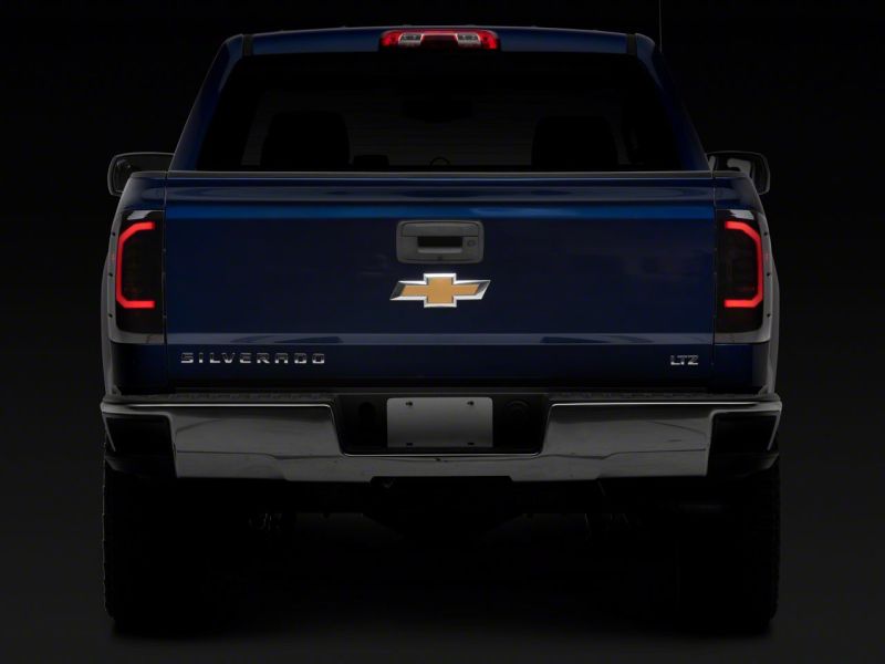 Raxiom 14-18 Chevrolet Silverado 1500 Axial Series LED Tail Lights- Black Housing (Smoked Lens) thumbnail 9
