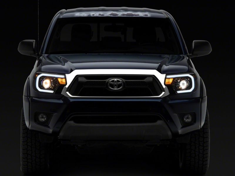 Raxiom 12-15 Toyota Tacoma Axial Series Projector Headlights w/ LED Bar- Black Housing (Clear Lens) thumbnail 7