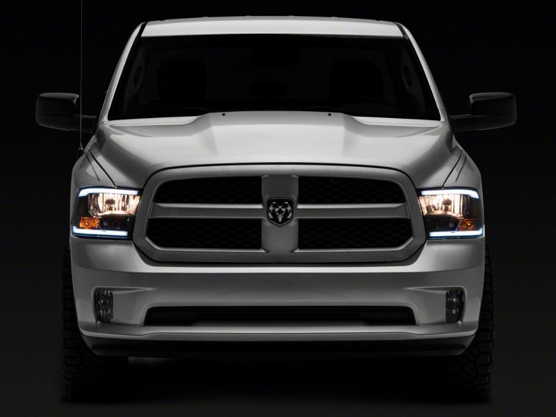 Raxiom 09-18 Dodge RAM 1500/2500/3500 Axial Series Headlights w/ LED Bar- Black Housing (Clear Lens) thumbnail 7