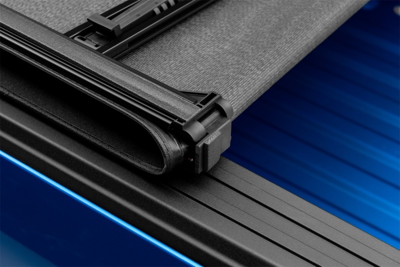Lund 04-17 Nissan Titan (5.5ft. Bed w/o Titan Box) Genesis Elite Tri-Fold Tonneau Cover - Black thumbnail 9