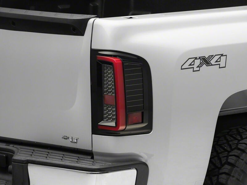 Raxiom 07-13 Chevrolet Silverado 1500 G2 LED Tail Lights- Black Housing- Smoked Lens thumbnail 5